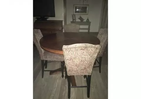 Counter-height wood table and 4 chairs